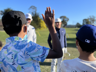 First Tee — Monterey County Participants Raising Their Hand.